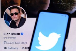 In this photo illustration, the Twitter logo is displayed on...