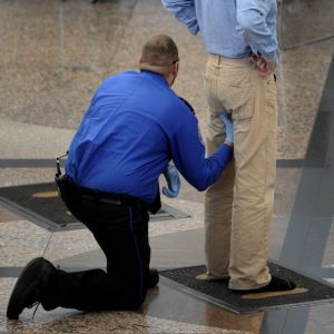 111710_PATDOWN_CFW- by a Transportation Security Administration agent while passing through security at Denver International Airport in Denver, CO, November 17, 2010. (Craig F. Walker/ The Denver Post)