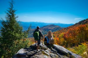 Couple hiking in the autumn mountains.