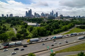 Aerial view of highway and city skyline