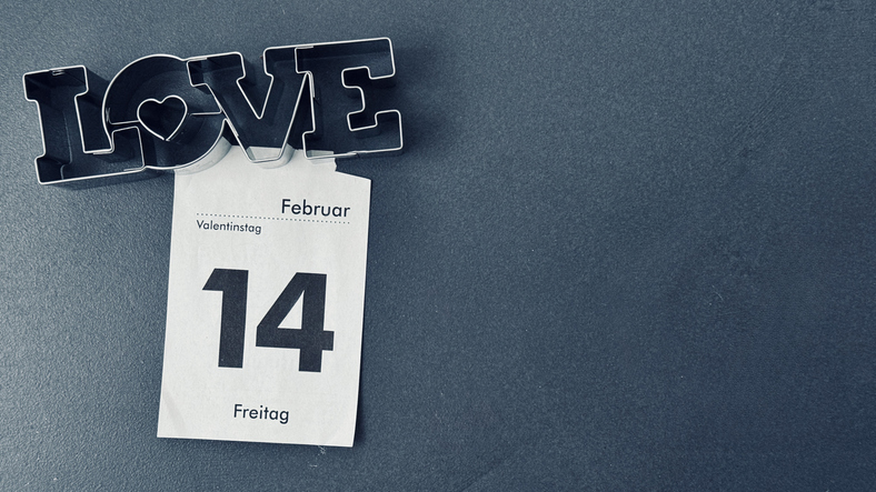 Valentine's day calendar sheet on grey background